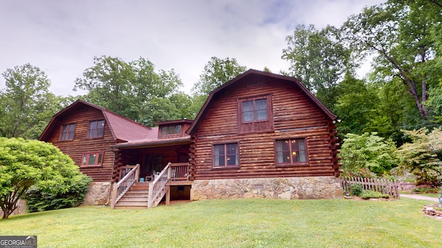 view of front of property featuring a front lawn and a porch