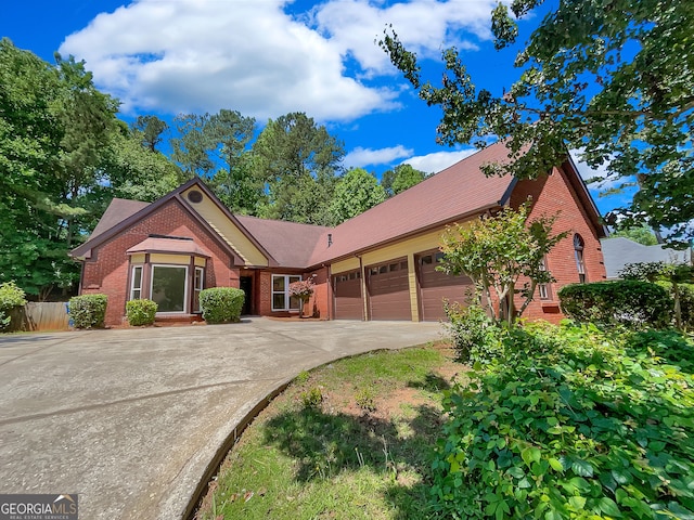 view of front of property with a garage