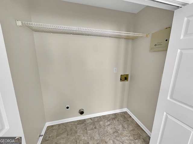 laundry area featuring hookup for a washing machine, hookup for an electric dryer, and light tile floors