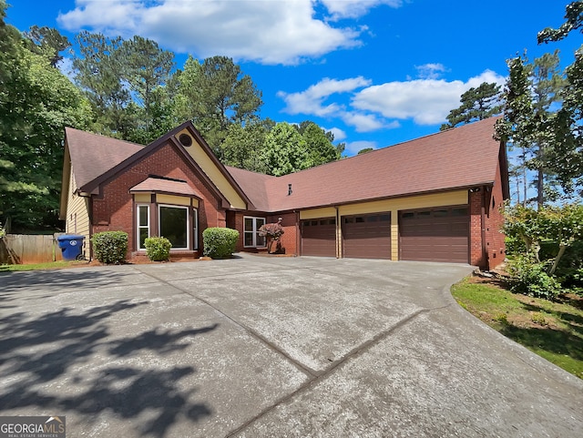 view of front of property with a garage