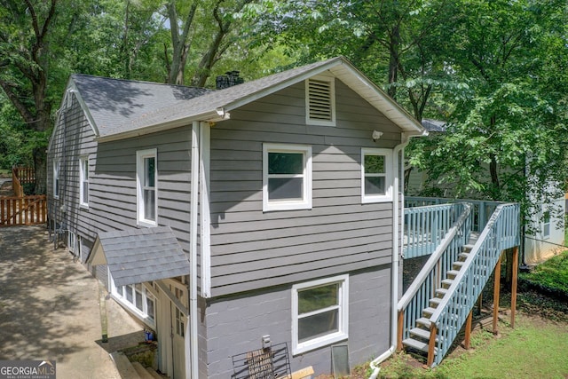 view of home's exterior featuring a deck