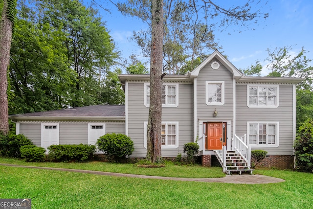 view of front facade with a front yard