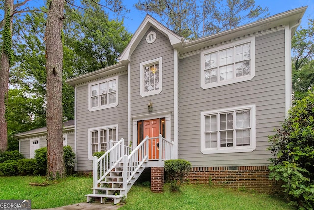 colonial home featuring crawl space