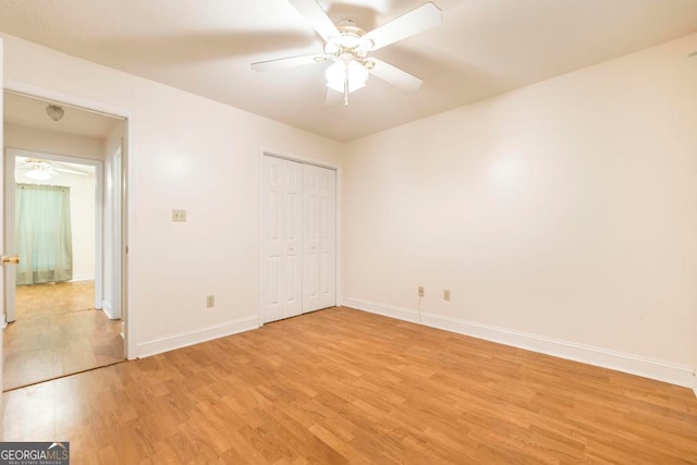 3650 Confederate Dr, Macon, GA 31211 - unfurnished bedroom with a closet, ceiling fan, and light hardwood / wood-style flooring