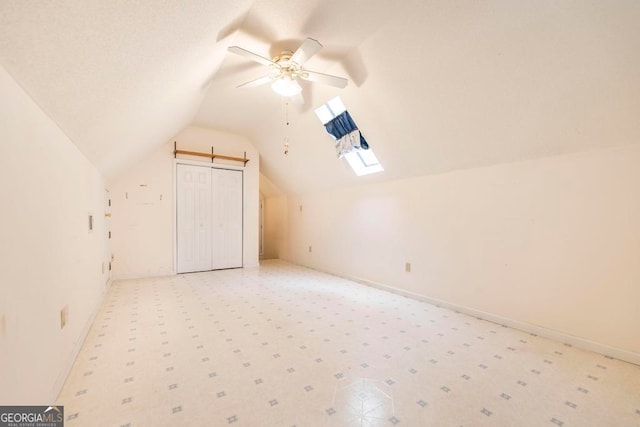3650 Confederate Dr, Macon, GA 31211 - additional living space with ceiling fan and lofted ceiling with skylight