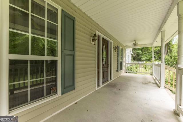 view of terrace featuring covered porch and ceiling fan