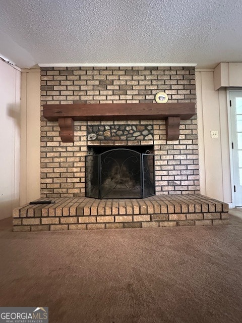 details with carpet flooring, a textured ceiling, and a fireplace