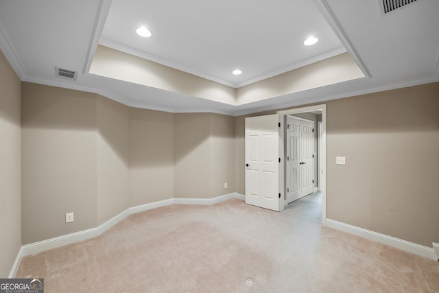 basement featuring ornamental molding and light carpet