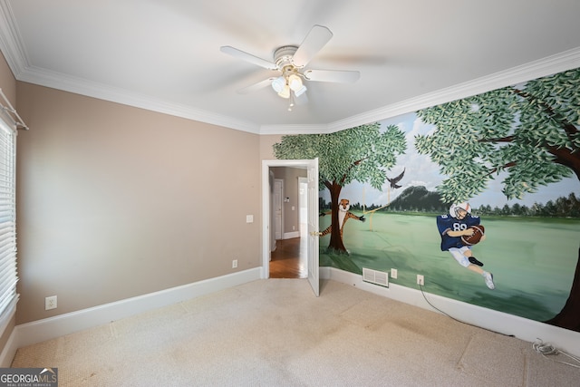 unfurnished bedroom with ceiling fan, crown molding, and carpet flooring