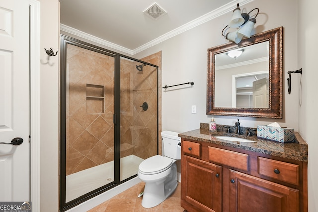 bathroom with crown molding, a shower with door, tile floors, toilet, and large vanity