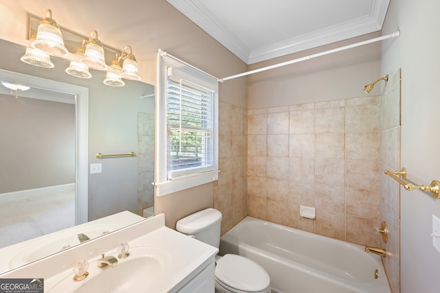 full bathroom with ornamental molding, tiled shower / bath combo, large vanity, and toilet