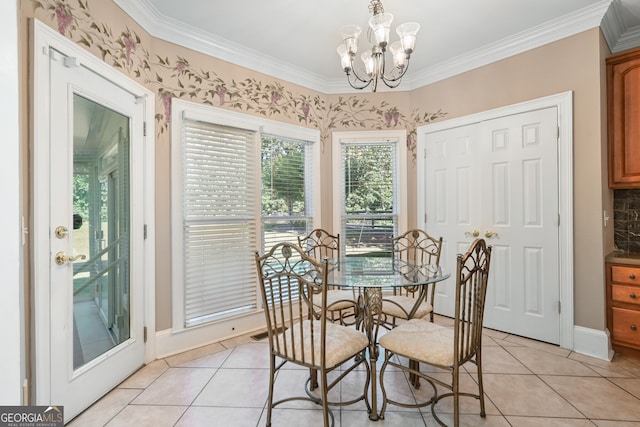 tiled dining room featuring a chandelier and ornamental molding