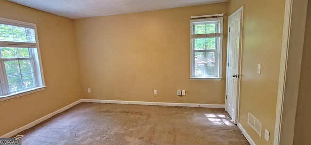 view of carpeted spare room