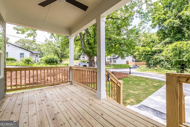 wooden deck with ceiling fan