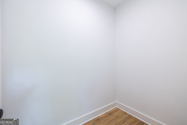 spare room featuring hardwood / wood-style flooring