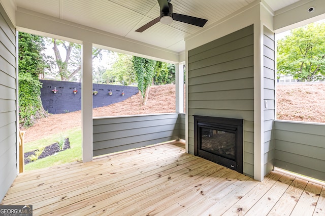 wooden terrace with ceiling fan