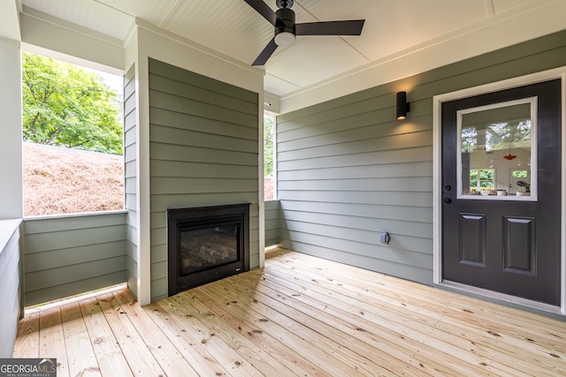 exterior space featuring ceiling fan