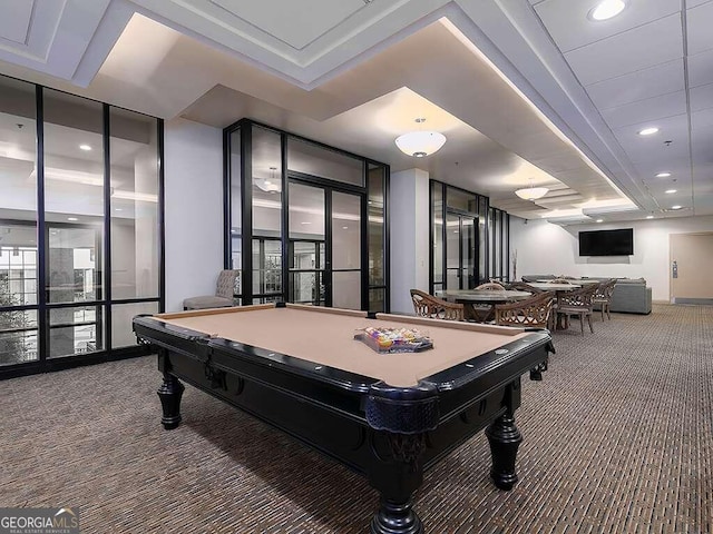 rec room with floor to ceiling windows, carpet, and pool table