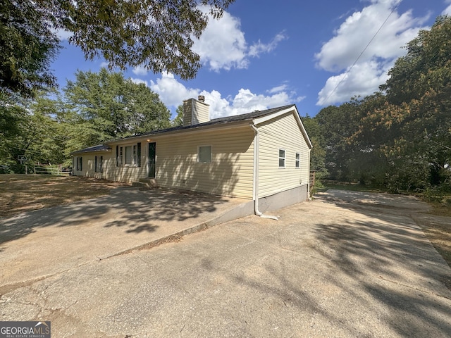 view of front of house with a patio area