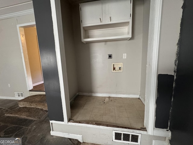 laundry area with ornamental molding, electric dryer hookup, and washer hookup