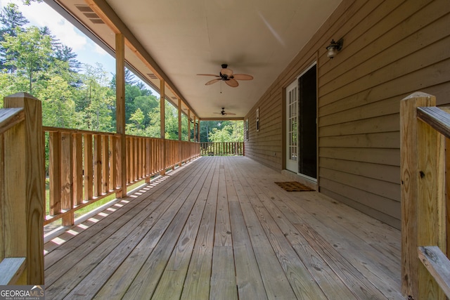 wooden terrace with ceiling fan