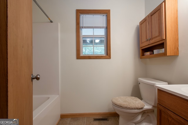 full bathroom featuring tile flooring, vanity, toilet, and shower / bathing tub combination