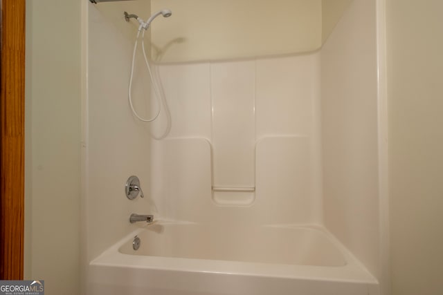 bathroom with shower / tub combination