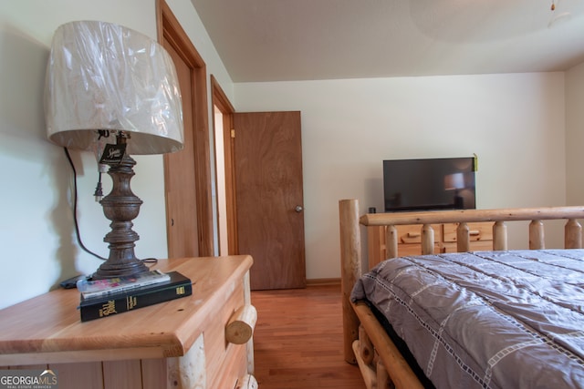 bedroom featuring hardwood / wood-style floors