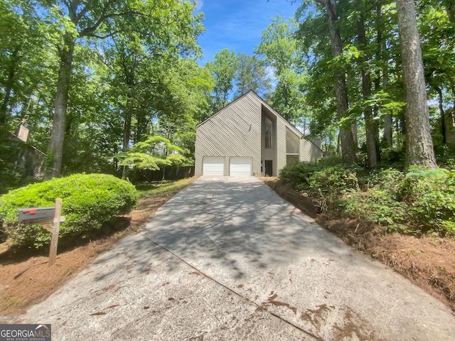 view of side of property featuring a garage