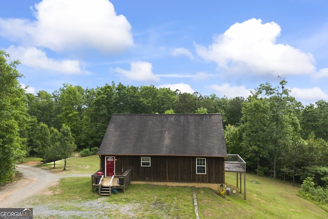 exterior space featuring a front lawn