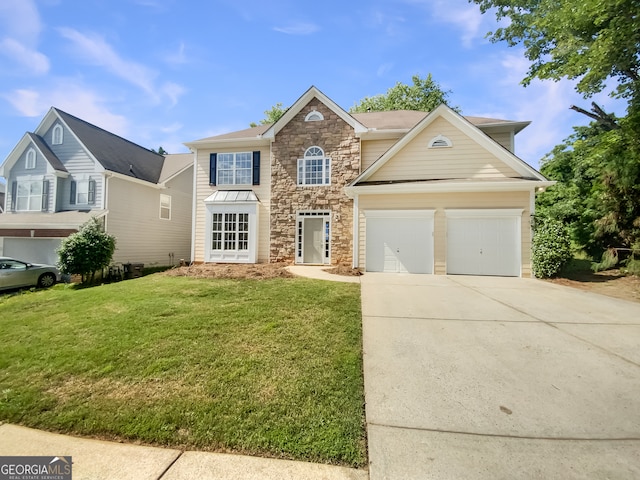 front of property with a garage and a front lawn