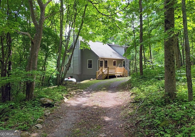 view of yard with a wooden deck