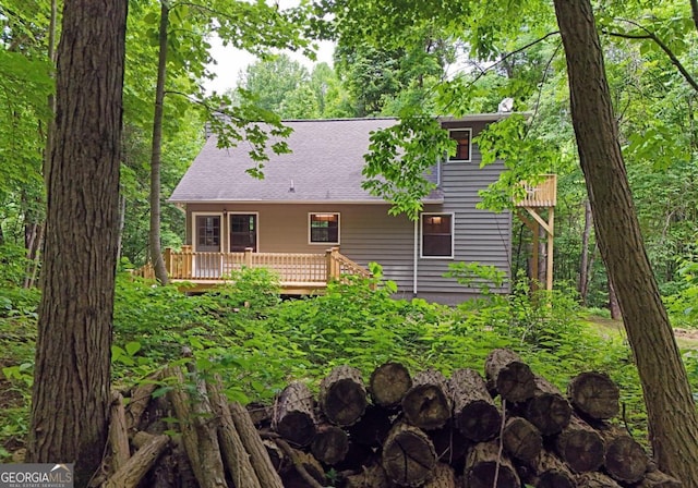 exterior space featuring a wooden deck