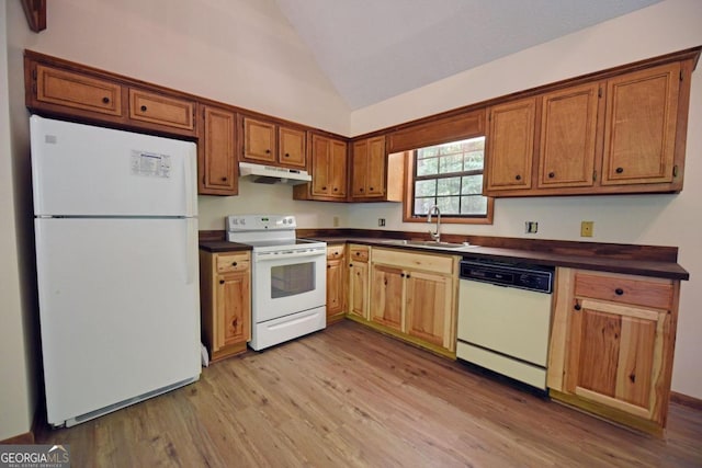 kitchen featuring white appliances, sink, high vaulted ceiling, and light wood-type flooring