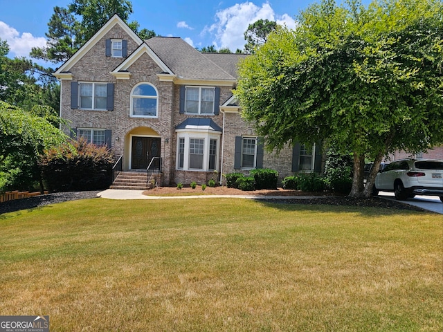 view of front of house with a front yard