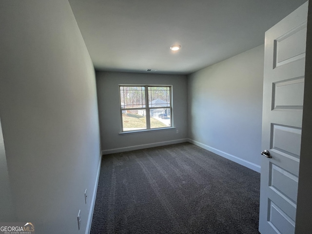 view of carpeted spare room