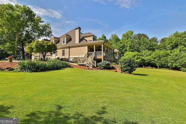 exterior space featuring a wooden deck