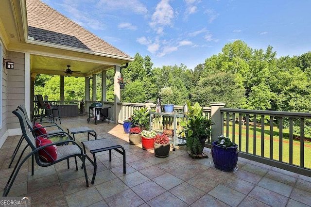 view of patio featuring ceiling fan