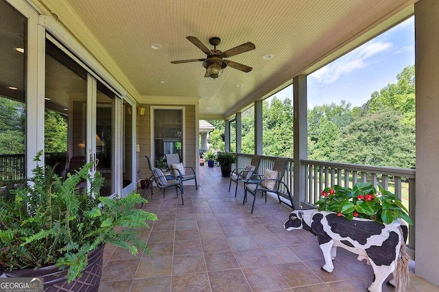 view of patio / terrace featuring ceiling fan