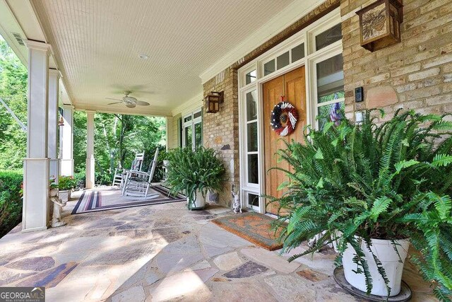 view of patio / terrace with covered porch and ceiling fan