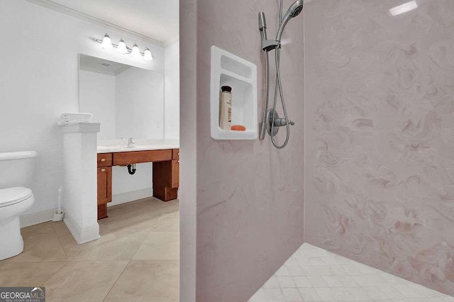 full bath featuring a shower, tile patterned floors, toilet, and vanity