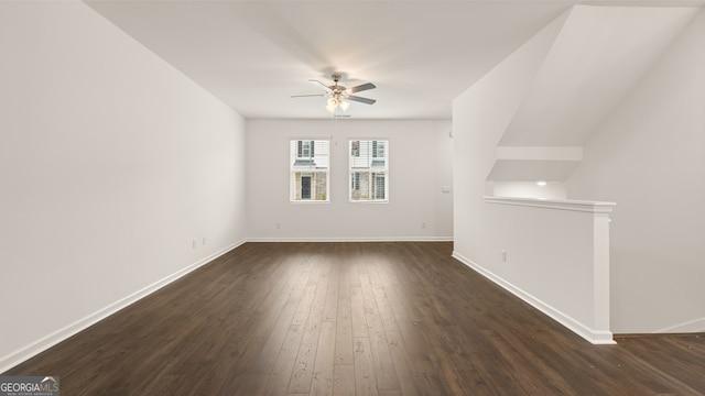 interior space featuring ceiling fan and dark hardwood / wood-style flooring