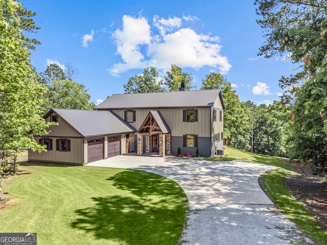 view of front facade featuring a front yard and a garage