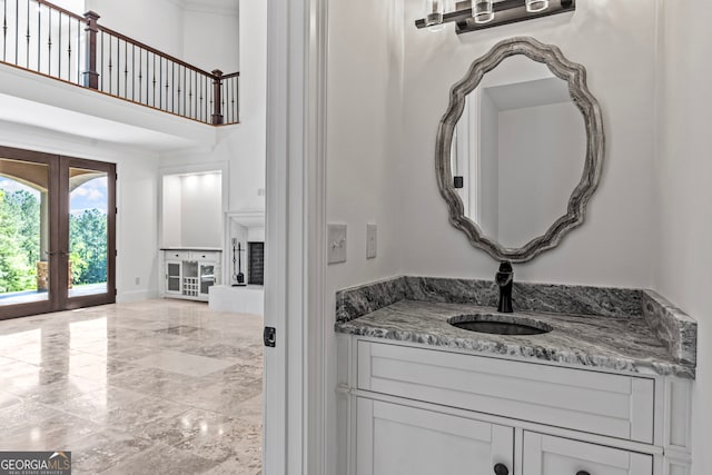 bathroom featuring vanity and french doors