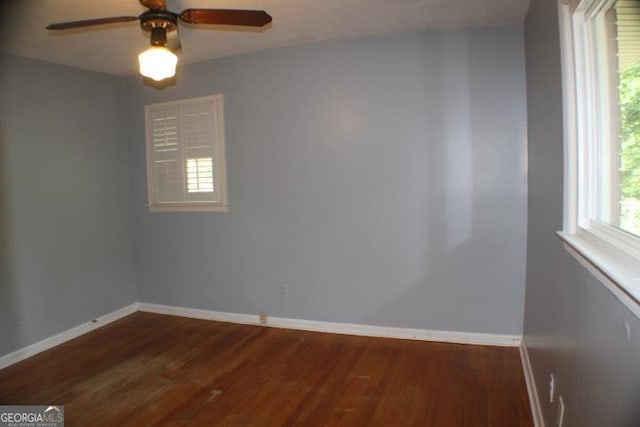 unfurnished room featuring ceiling fan and hardwood / wood-style flooring