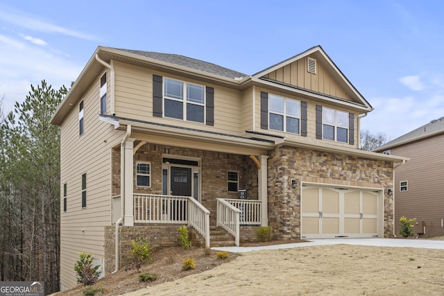 craftsman house featuring a porch and a garage