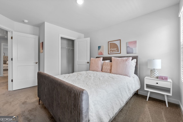 carpeted bedroom with a closet