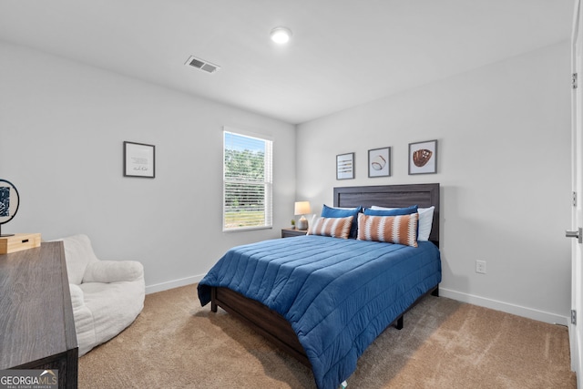 bedroom featuring carpet