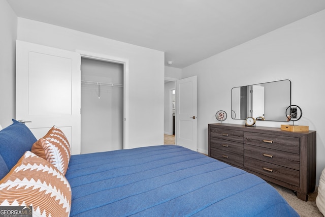 carpeted bedroom featuring a closet