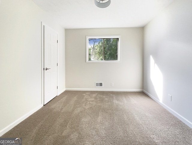 view of carpeted spare room